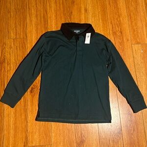 Boys long sleeve collared shirt. Color: dark green with black corduroy collar.